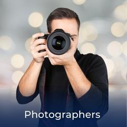 Man taking wedding photos with large professional camera, link to Hire a Photographer