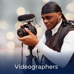 Man setting up video recording equipment at a wedding, link goes to Videographers for hire