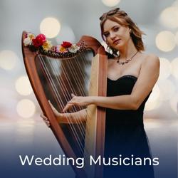 Harpist playing music at a wedding with link to where to hire musicians for a wedding